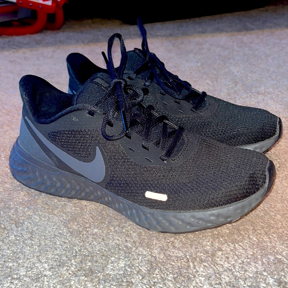 All black Nike Revolution Running Sneakers